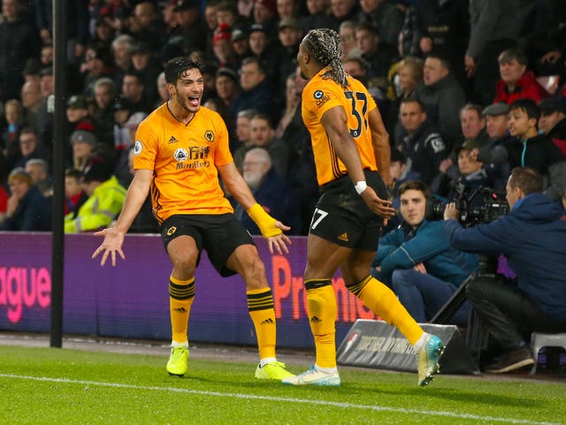 Raul Jimenez, left, scored his sixth goal in seven Premier League matches after extending Wolves' unbeaten league run to eight matches with a 2-1 win at Bournemouth