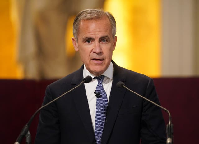 Mark Carney speaks to an audience in London