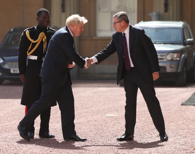 Boris Johnson arrives at Buckingham Palace