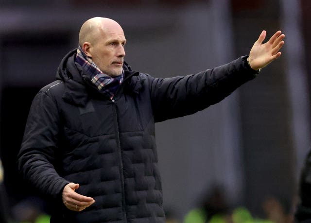 Philippe Clement puts his arm up on the touchline