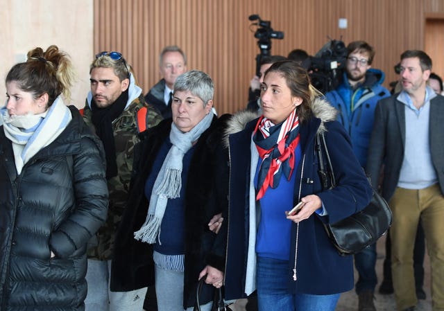 Emiliano Sala's mother Mercedes (centre) and sister Romina (right) arrive back at Guernsey airport