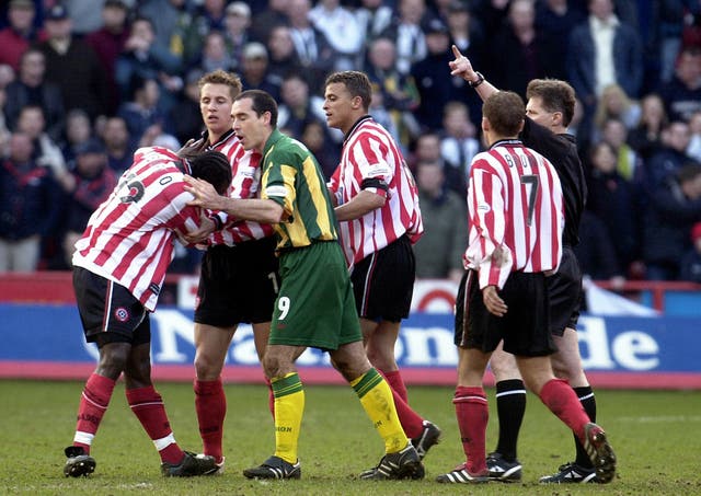 Sheffield United's Patrick Suffo (left) becomes the third player to be sent off 