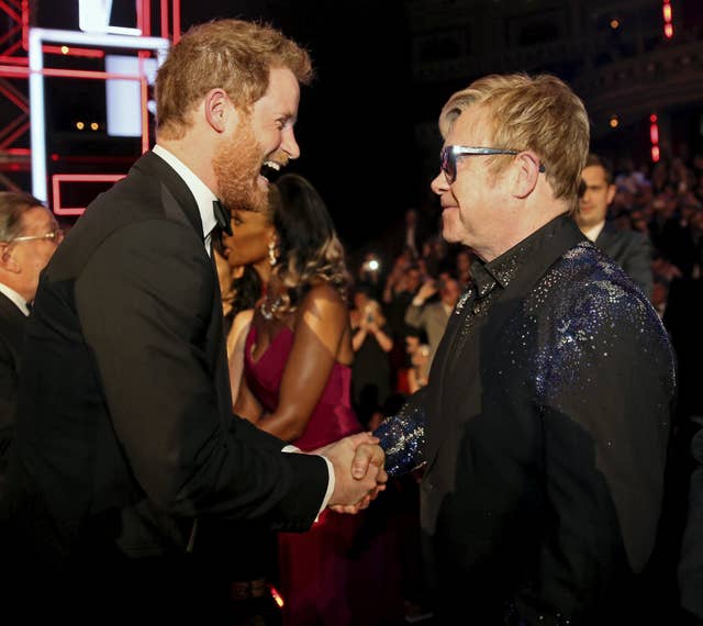 Sir Elton has a close relationship with bridegroom Harry and his brother, the Duke of Cambridge (Paul Hackett/PA)