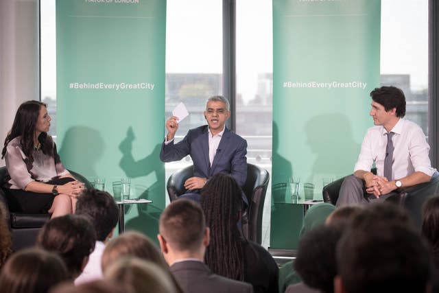 Sadiq Khan, centre, takes questions with Jacinda Ardern and Justin Trudeau (Stefan Rousseau/PA)