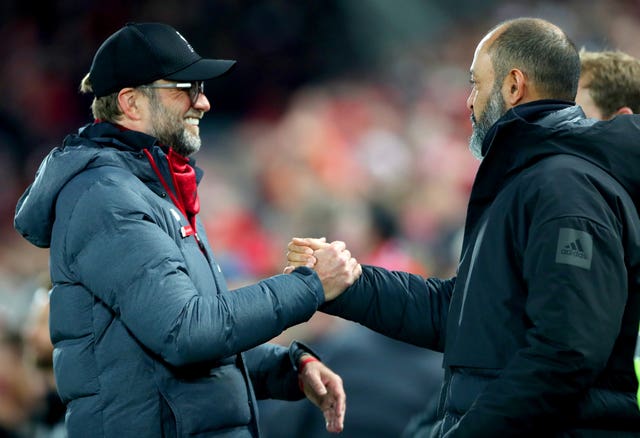 Liverpool manager Jurgen Klopp (left) and Wolves manager Nuno Espirito Santo 