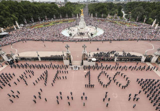 RAF personnel within the grounds of Buckingham Palace form a message for the Queen