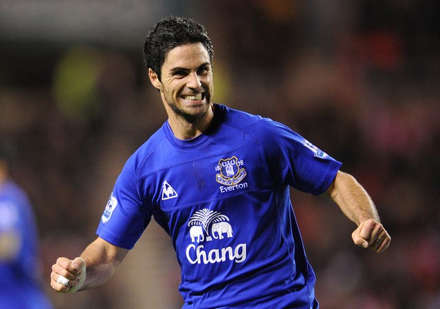 Arsenal boss Mikel Arteta in an archive photo from when he was an Everton player, grinning and wearing a blue Everton shirt (Owen Humphreys/PA)