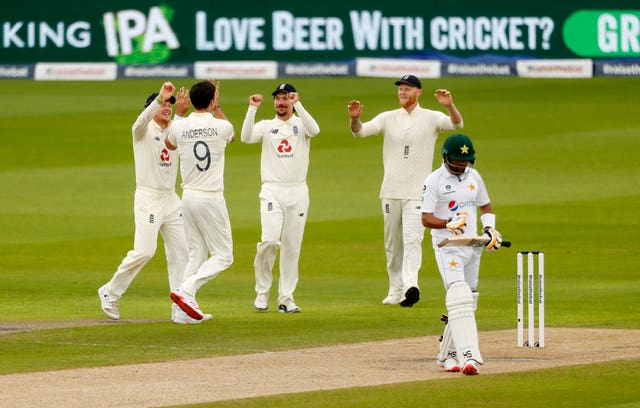 Anderson celebrates taking the wicket of Pakistan's Babar Azam