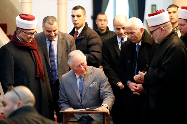 The Prince of Wales during a visit to the Mosque of Omar
