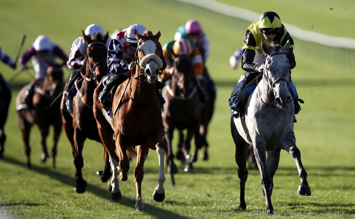 Specialise, ridden by David Egan (right), won the British EBF Premier Fillies Handicap at Newmarket.