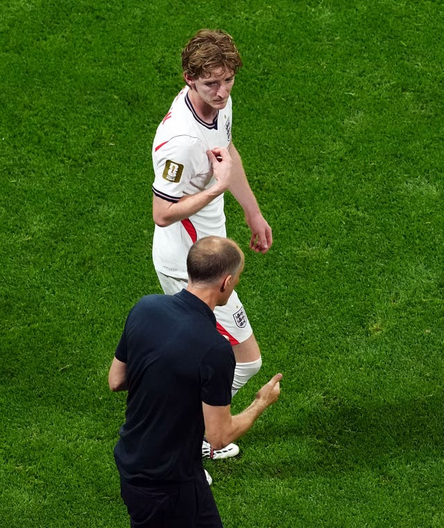 England’s Anthony Gordon, top, with Thomas Tuchel after scoring against Argentina