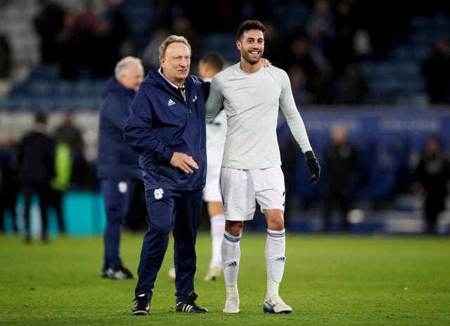 Cardiff manager Neil Warnock (left) and midfielder Victor Camarasa (right) (PA)