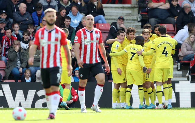 Marcos Alonso, sixth right, celebrates with team-mates including fellow scorers Mason Mount, seventh right, and Timo Werner,  and Timo Werner, fourth right