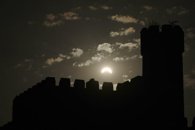 The solar eclipse as seen over Cardiff Castle
