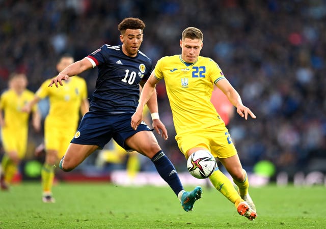 Scotland’s Che Adams (left) and Ukraine’s Mykola Matviyenko battle for the ball during the FIFA World Cup 2022 Qualifier play-off in June