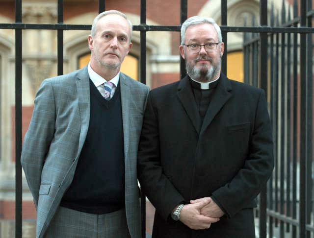 Canon Jeremy Pemberton, right, and husband Laurence Cunnington (David Mirzoeff/PA)