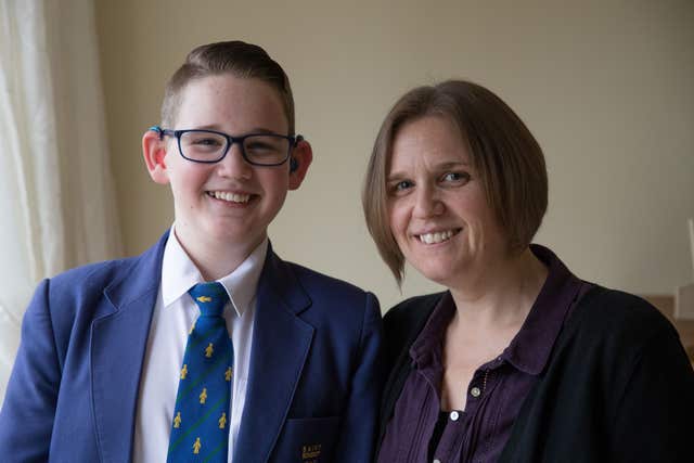 Jacinta Litherland from Derby with her son Reuben Litherland, 14, who was born deaf and has started lunchtime lessons to teach sign language at his school, and who is amongst those who have received an invitation to the wedding of Prince Harry and Meghan Markle at Windsor Castle (Aaron Chown/PA)