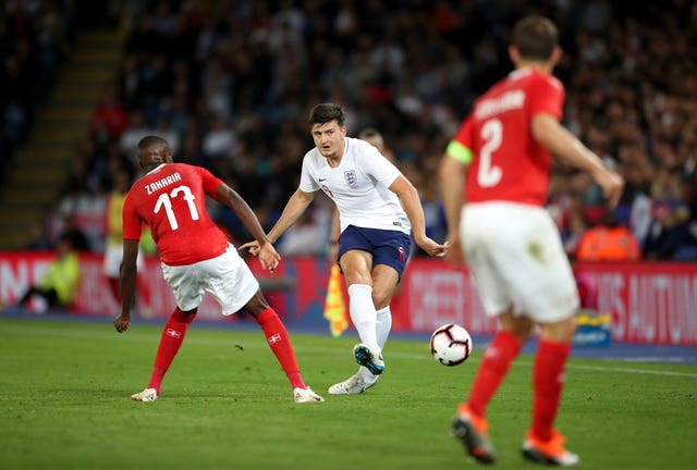 England’s Harry Maguire (centre).