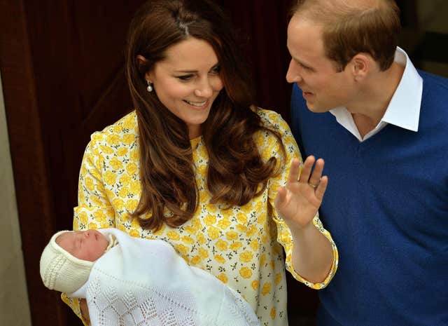 William and Kate with Princess Charlotte at the Lindo Wing (John Stillwell/PA)