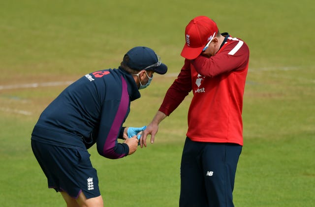 Eoin Morgan (right) suffered a dislocated finger 