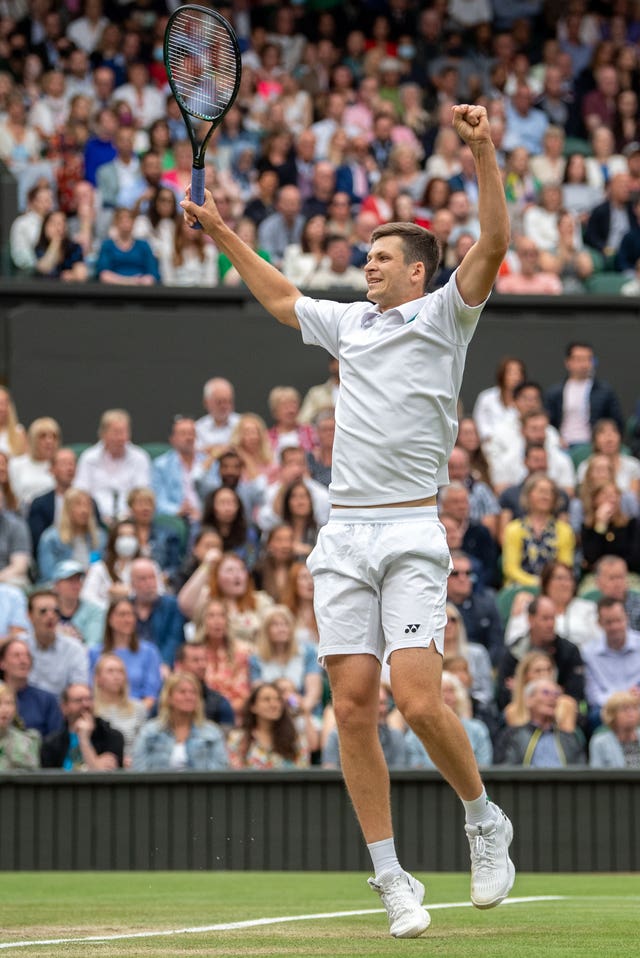 The crowd applauds as Hubert Hurkacz celebrates his Men's Singles fourth round victory over Daniil Medvedev on Centre Court