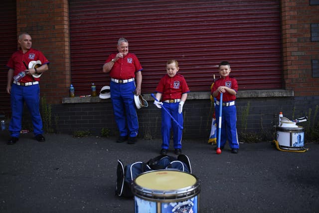 Members of the Orange order gather at Clifton street Orange hall in Belfast