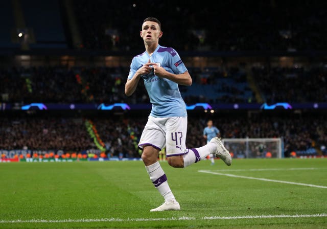 Phil Foden celebrates scoring City's second goal of the game