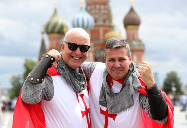 England fans Dexter Marshall and Miles Rudham (right) are getting into the mood in Red Square