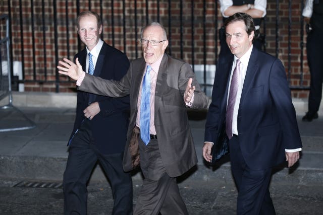 Guy Thorpe-Beeston (left) and Alan Farthing (right) leaving St Mary’s Hospital in London with Marcus Setchell, then the Surgeon Gynaecologist to Queen, following the birth of Prince George (Sean Dempsey/PA)