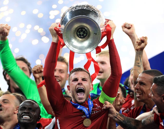 Liverpool’s Jordan Henderson lifted the Champions League trophy on Saturday