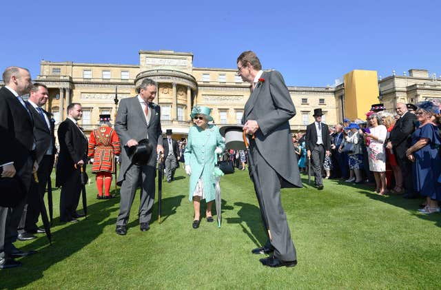 The Queen during a garden party at Buckingham Palace in 2018
