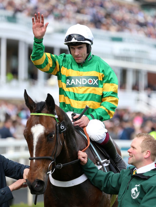 Aidan Coleman salutes the crowd aboard Jonbon