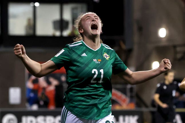 Kerry Beattie celebrates her first international goal