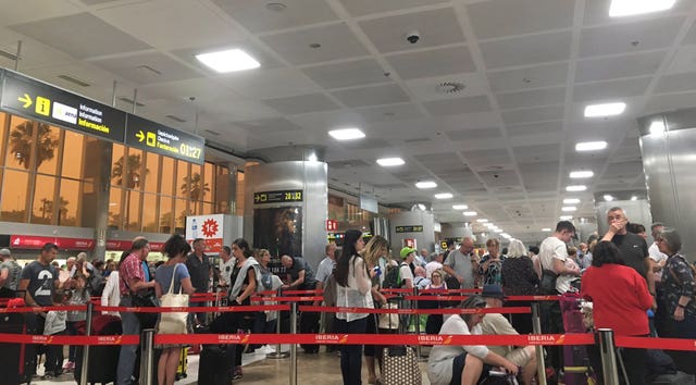 Passengers queuing at Tenerife South airport