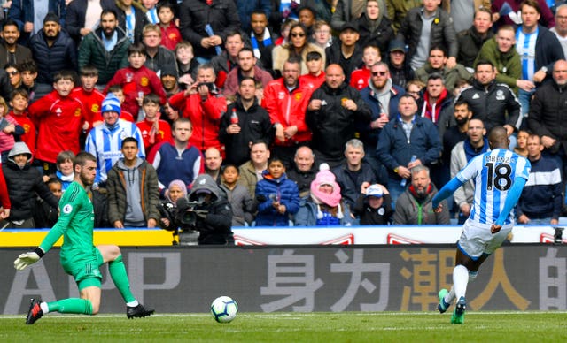 Isaac Mbenza, right, beats De Gea to equalise