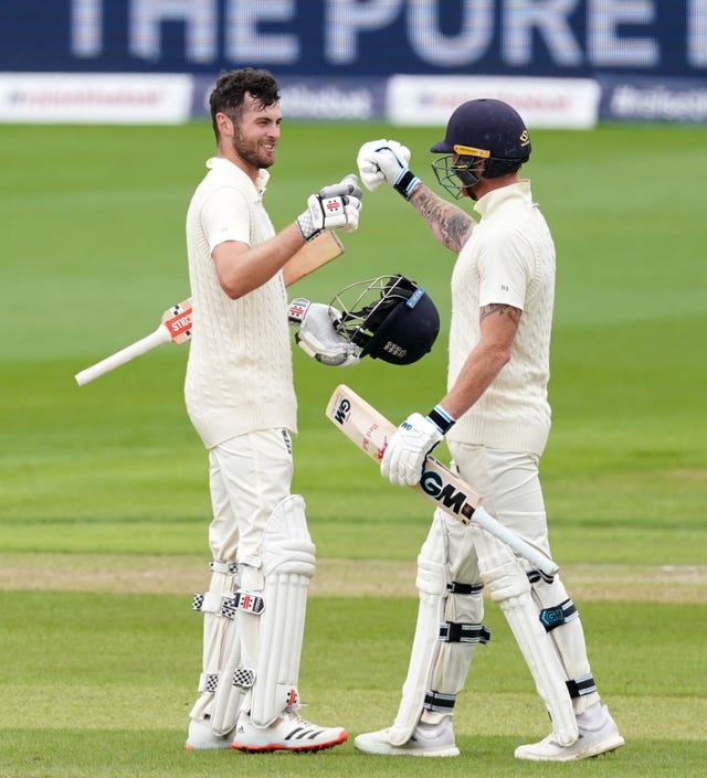 England's Dom Sibley celebrates with Ben Stokes after making his century