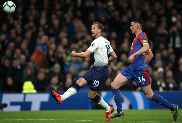 Harry Kane, left, sees an effort fly over the crossbar