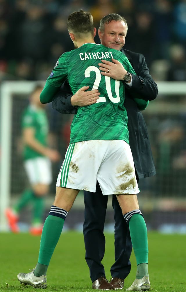 Craig Cathcart (left)