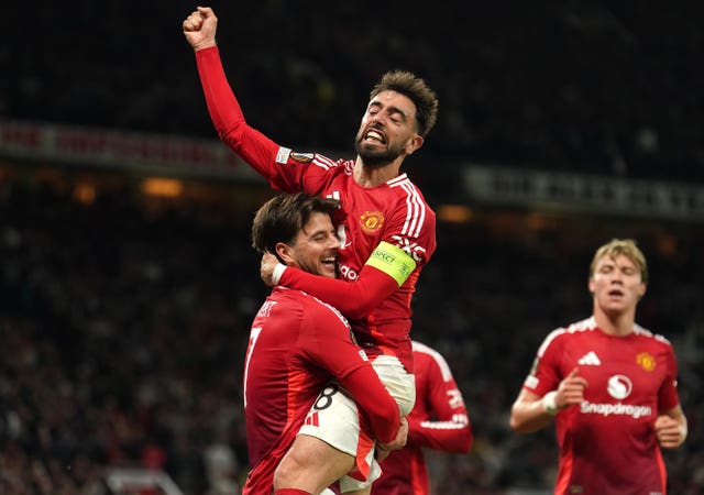 Manchester United’s Mason Mount celebrates with Bruno Fernandes