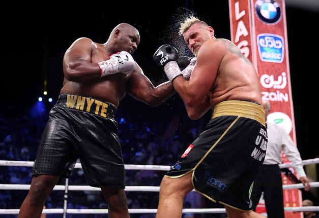 Dillian Whyte, left, takes on Tyson Fury on Saturday
