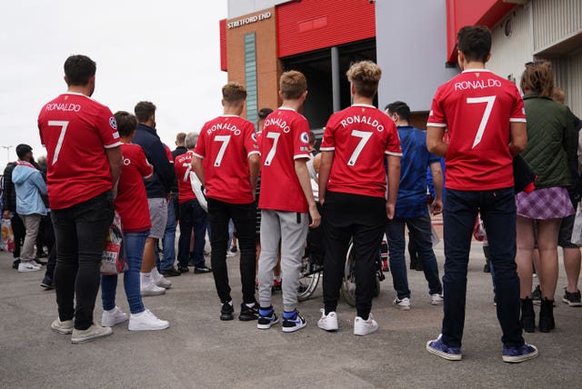 Fans wearing Ronaldo shirts before the game