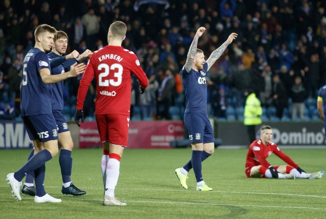 Kilmarnock's players celebrate beating Rangers