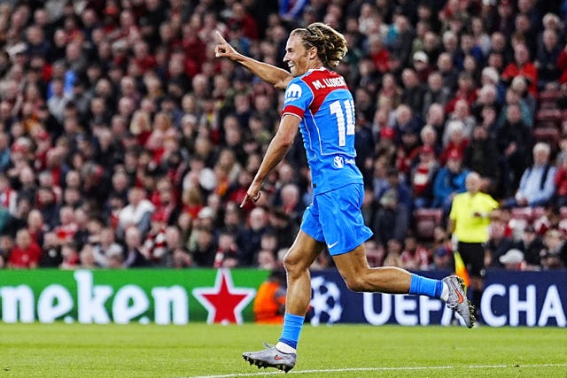 Marcos Llorente celebrates after scoring for Atletico Madrid