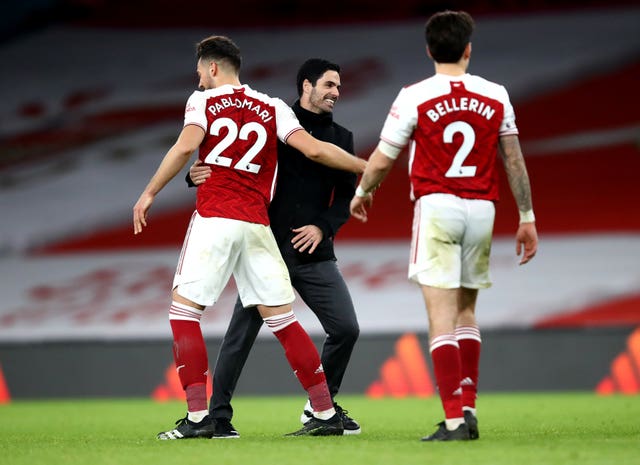 Arsenal have eased the pressure on Mikel Arteta (centre) with three successive wins