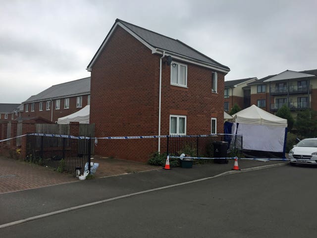 A house surrounded by police tape