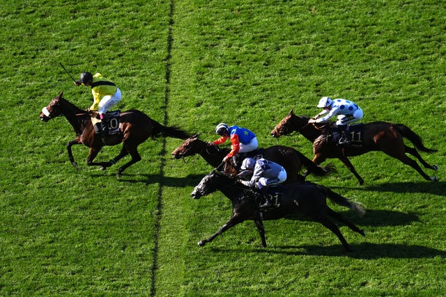 Miss Information passes the post in front in the Kensington Palace Stakes