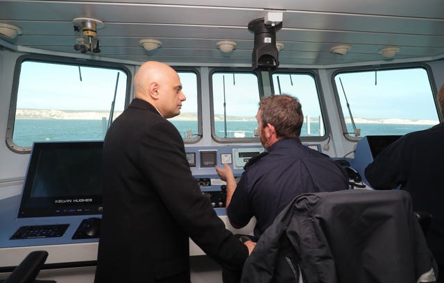 Sajid Javid meets Border Force staff on board HMC Searcher in Dover
