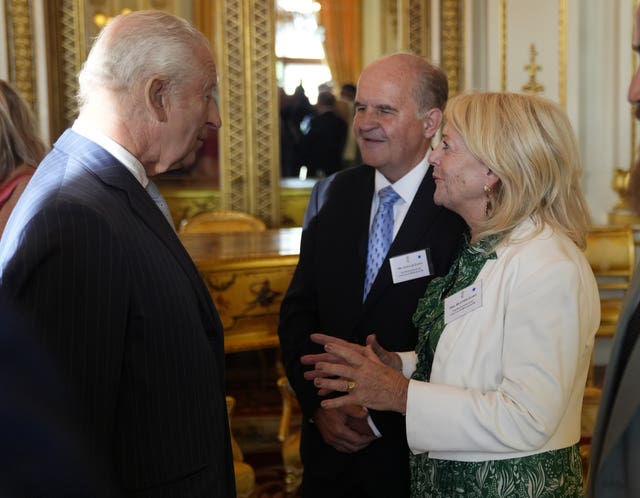 Alistair and Heather James meet the King