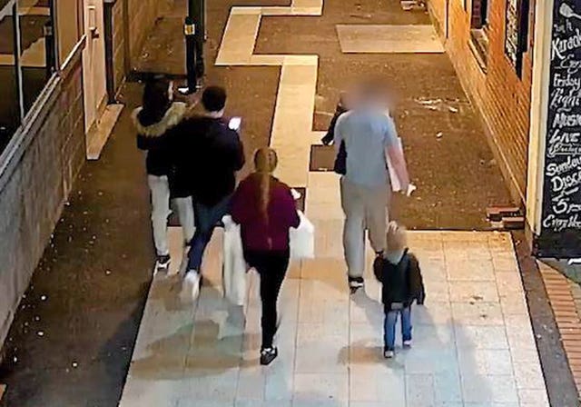 Video grab taken from CCTV of Stephen Waterson and Adrian Hoare, left, with Alfie Lamb, right, with the other people who were in the car, returning from a shopping trip to Sutton on the day Alfie died