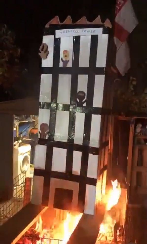 The model of Grenfell Tower being burned